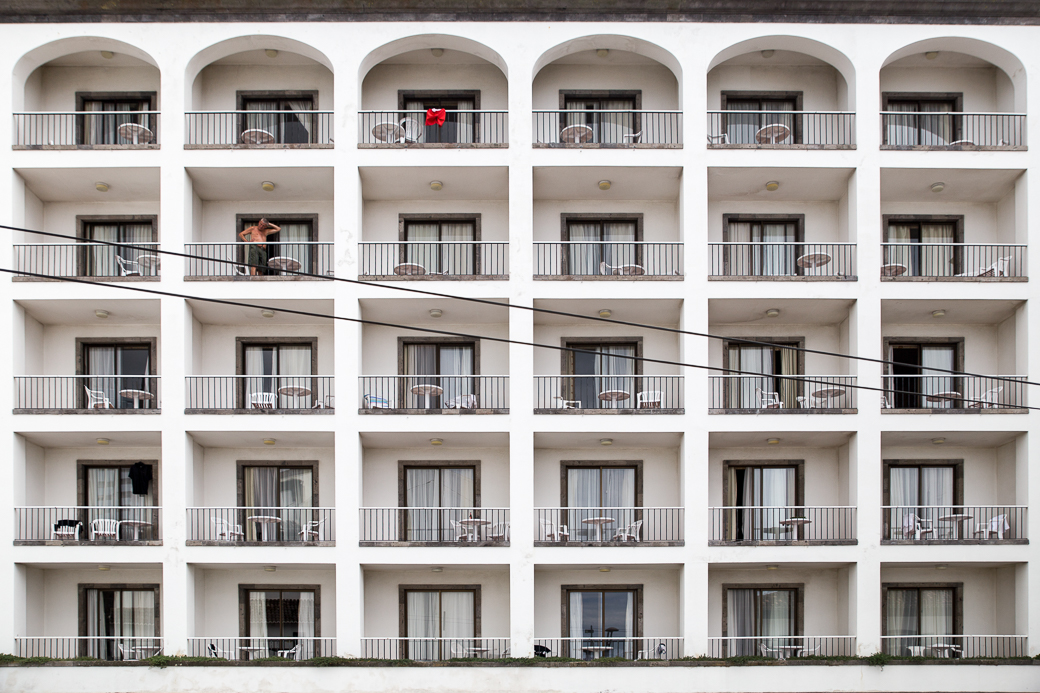 Old man and red swimsuit